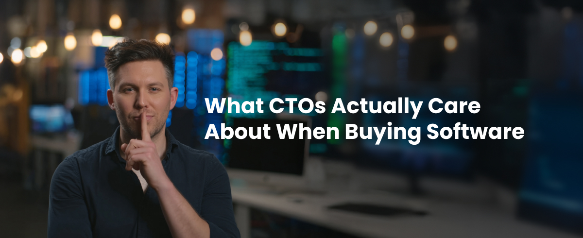 What CTOs Actually Care About When Buying Software. CTO holds a finger to his mouth with a backdrop of servers behind him